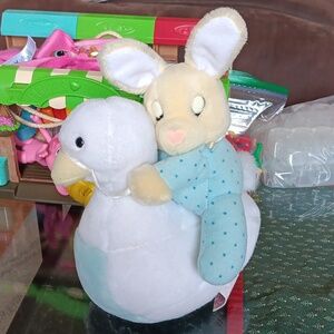 ROCKING BUNNY WIND UP DOLL